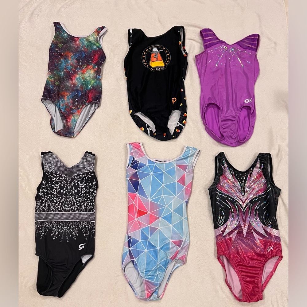 6 GK and other brand leotards (3 GK and 1 plum) sized from CL - AXS.